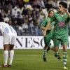 centrocampista-Cacereno-Chapi-celebra-primer-gol-encuentro-defensa-Malaga-Jesus-Gamez-durante-partido-correspondiente-vuelta-dieciseisavos-final-Copa-Rey